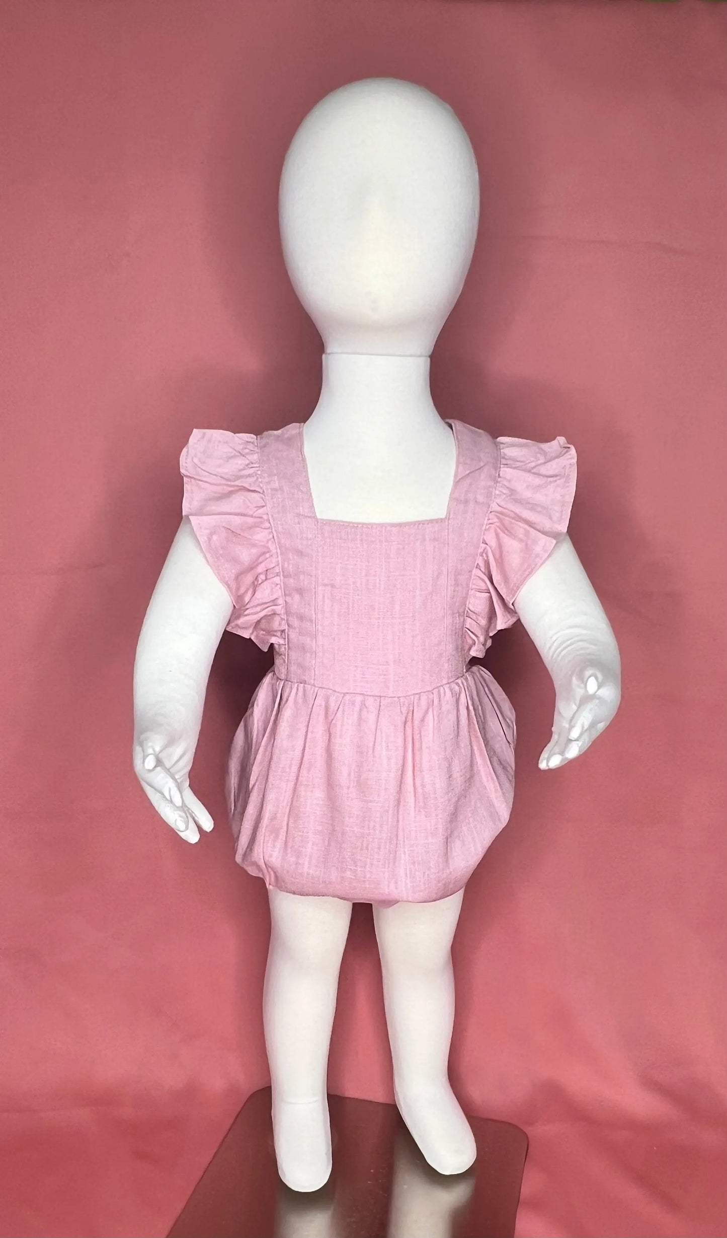 Cross Back Ruffle Bubble Romper Pink Poodle Designz