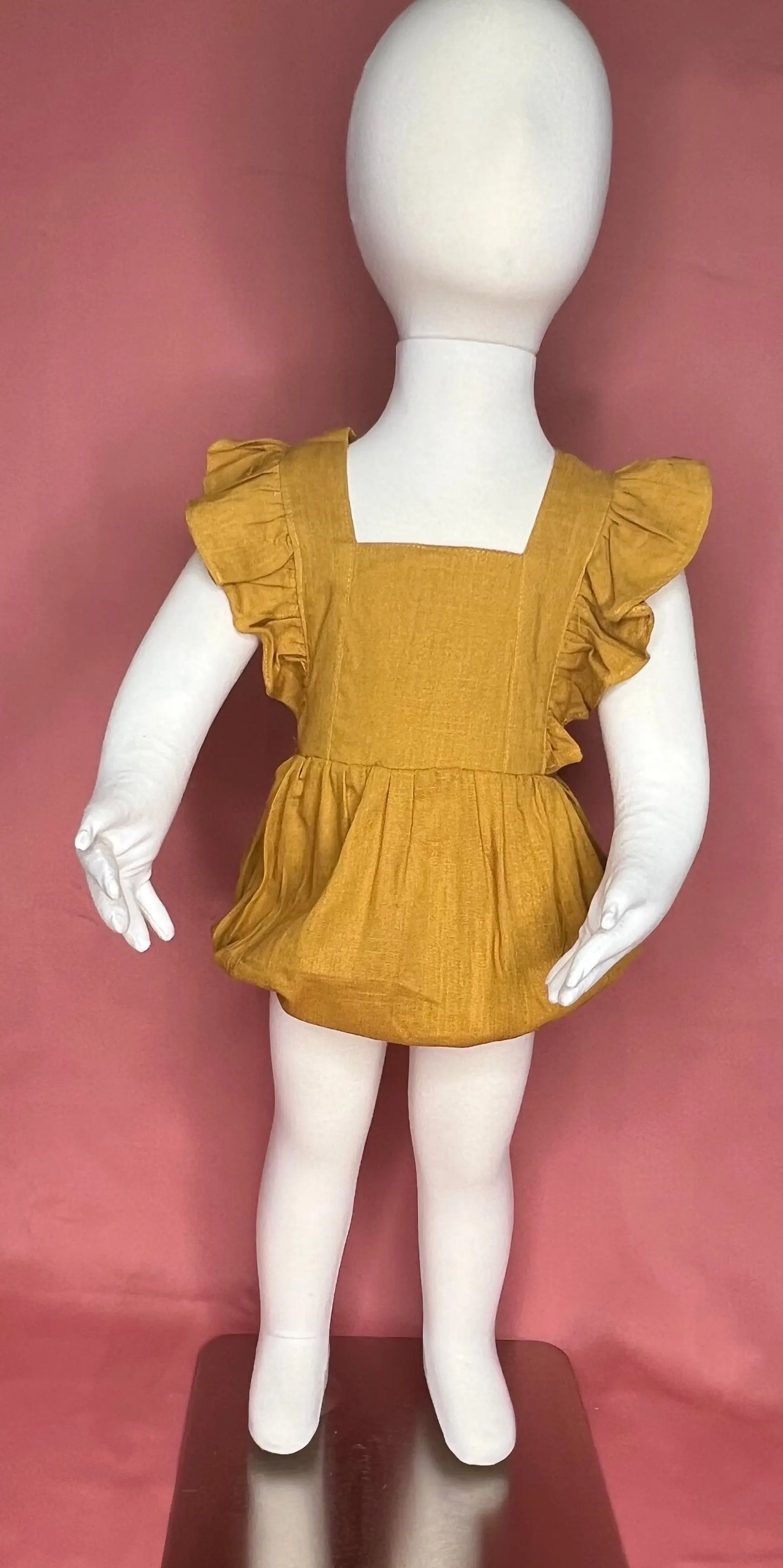 Cross Back Ruffle Bubble Romper Pink Poodle Designz