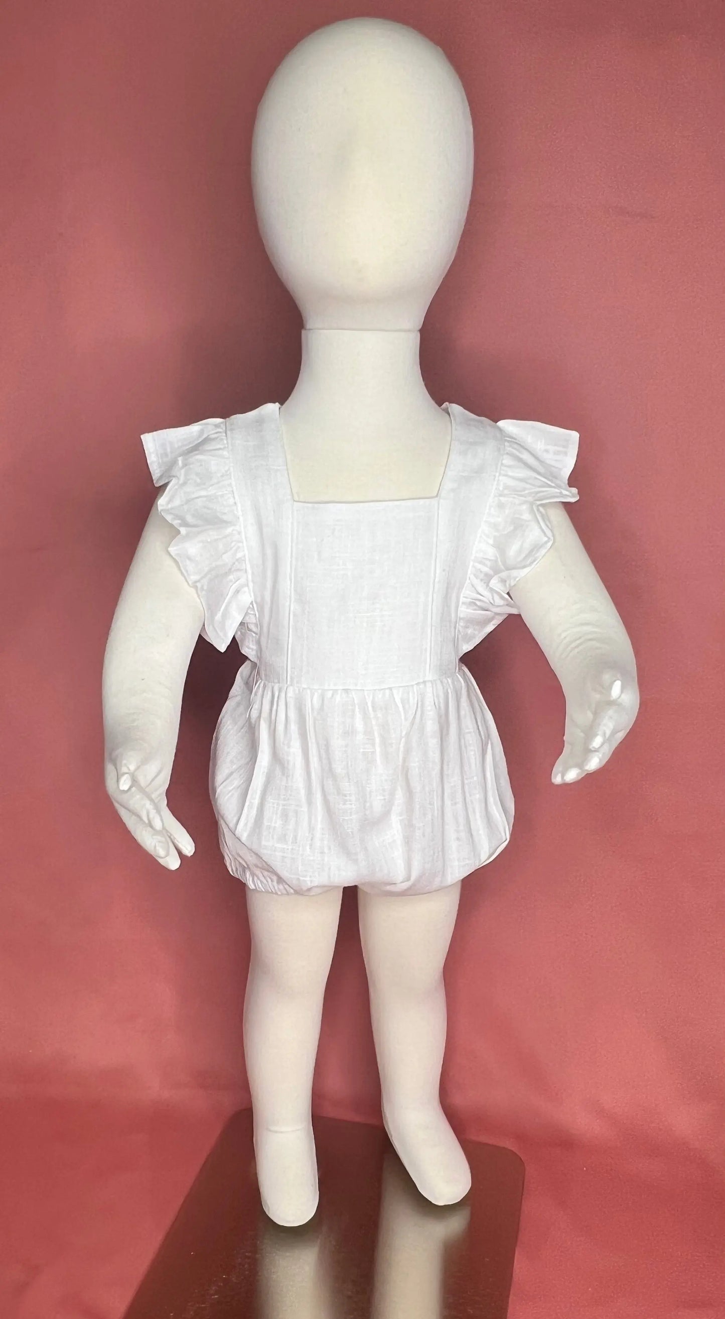 Cross Back Ruffle Bubble Romper Pink Poodle Designz