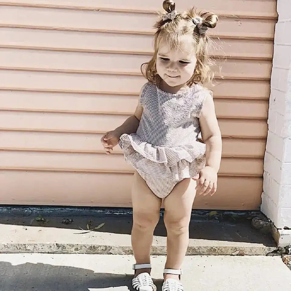 Peplum Ruffle Muslin Romper Pink Poodle Designz